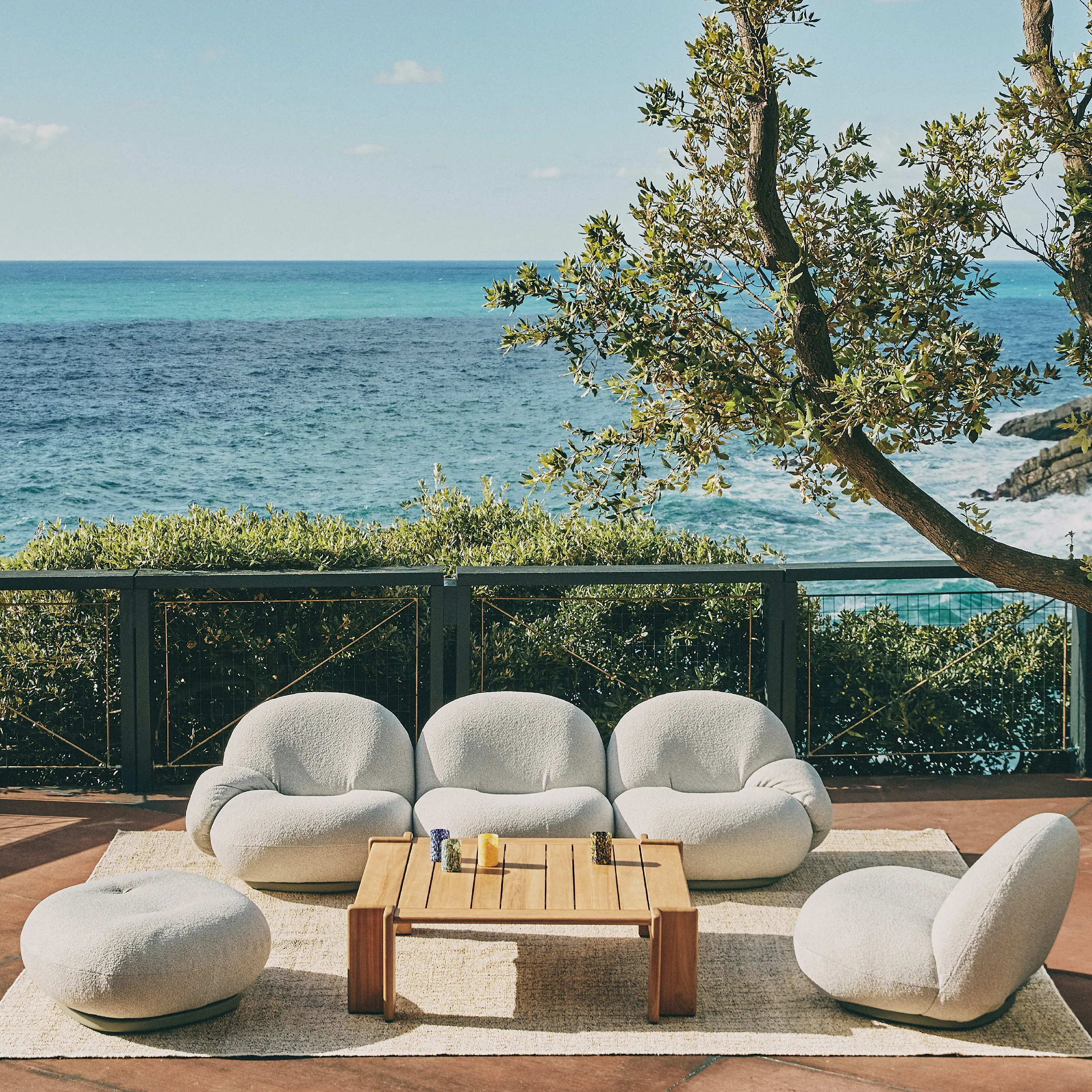 Pacha Outdoor Three-Seater Sofa With Armrests